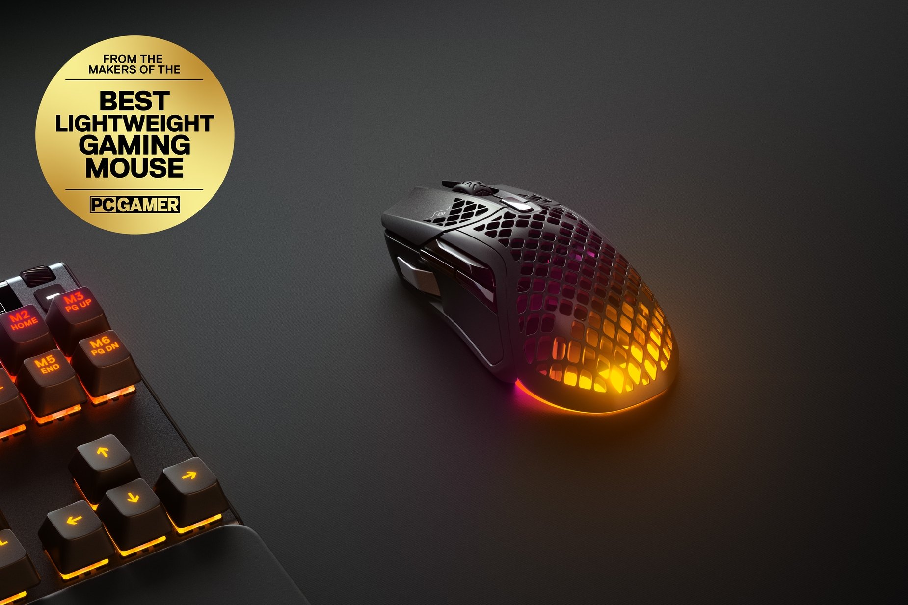
 An Aerox 5 Wireless mouse featuring a badge with text that reads "from the makers of the best lightweight gaming mouse by PC Gamer."
 