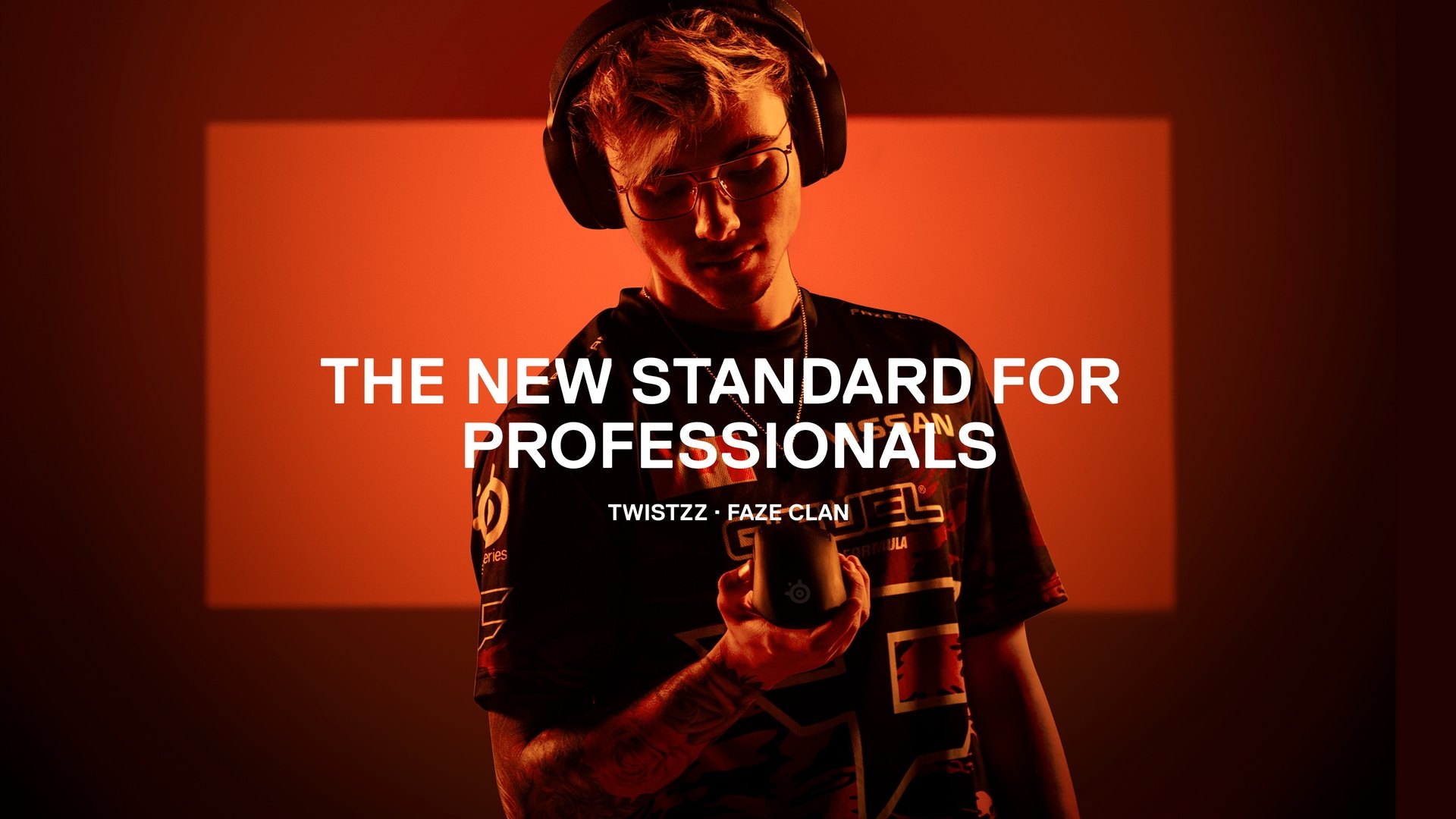FaZe player Twistzz holds a Prime mouse. Text reads "The new standard for professionals."