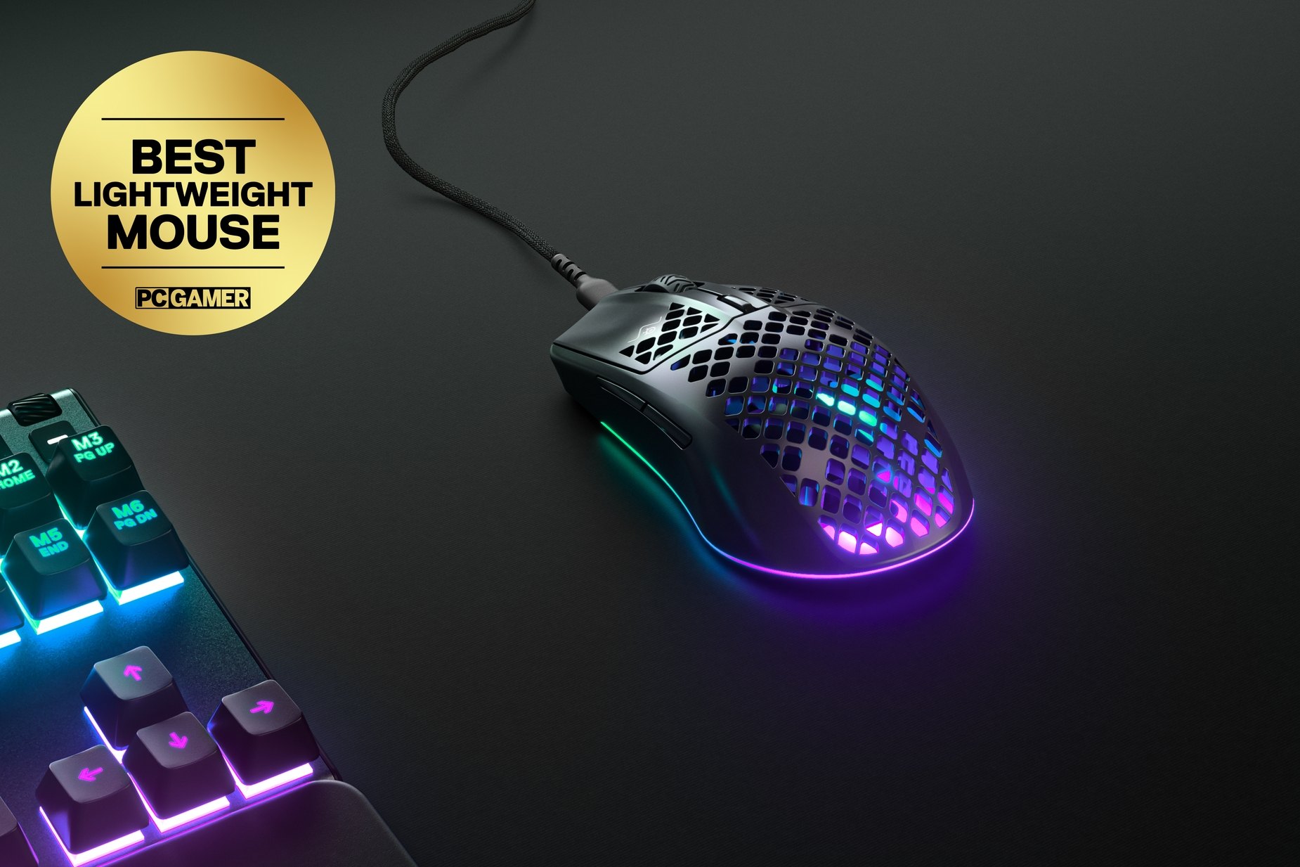 
 Aerox 3 (2022), sitting next to a SteelSeries keyboard. Award sticker reads, "Best Lightweight Mouse: PC Gamer."
 