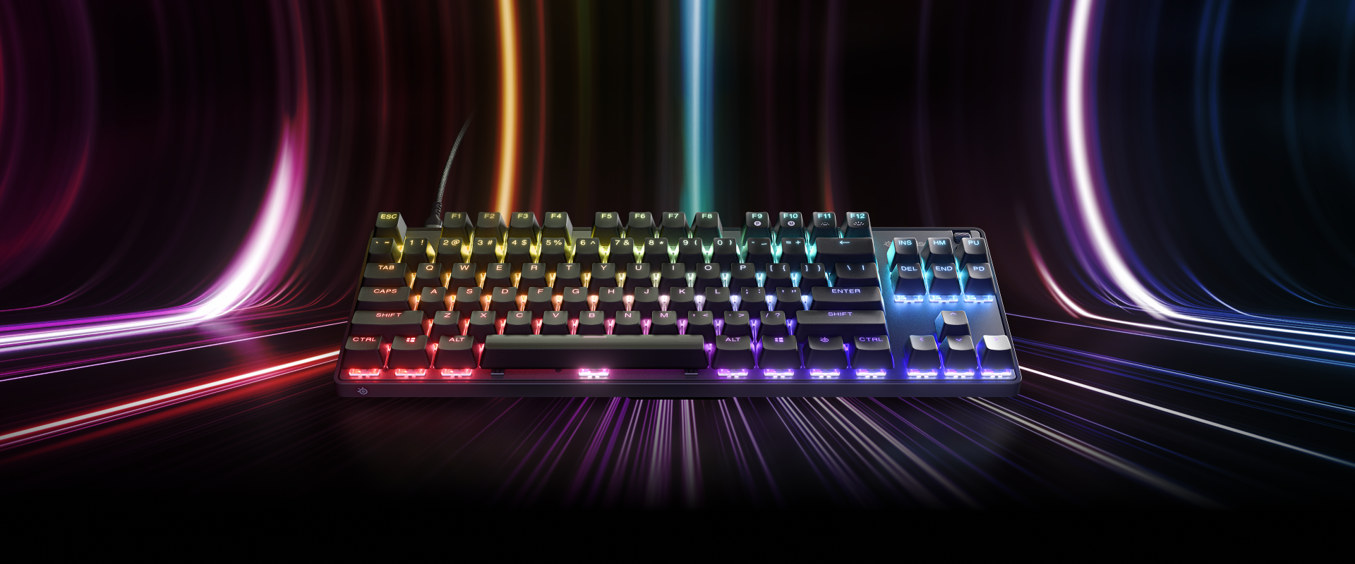 An Apex 9 TKL Keyboard with abstract light beams behind it.