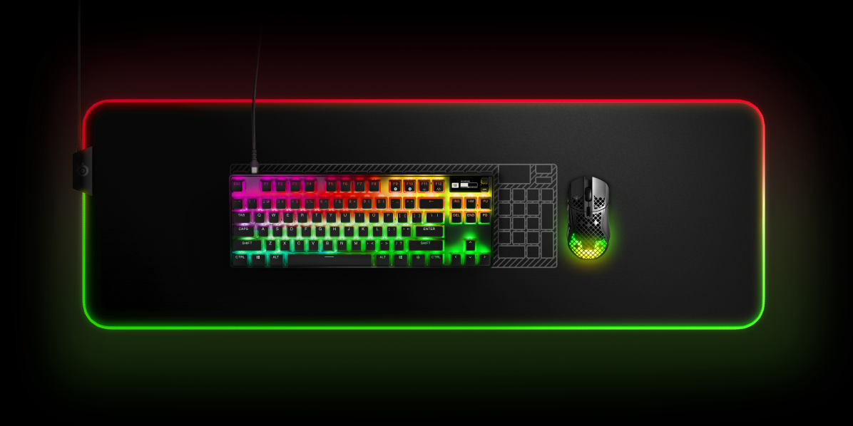 
 An Apex Pro TKL keyboard with a blueprint of a full size Apex Pro keyboard behind it to illustrate the layout and size difference.
 