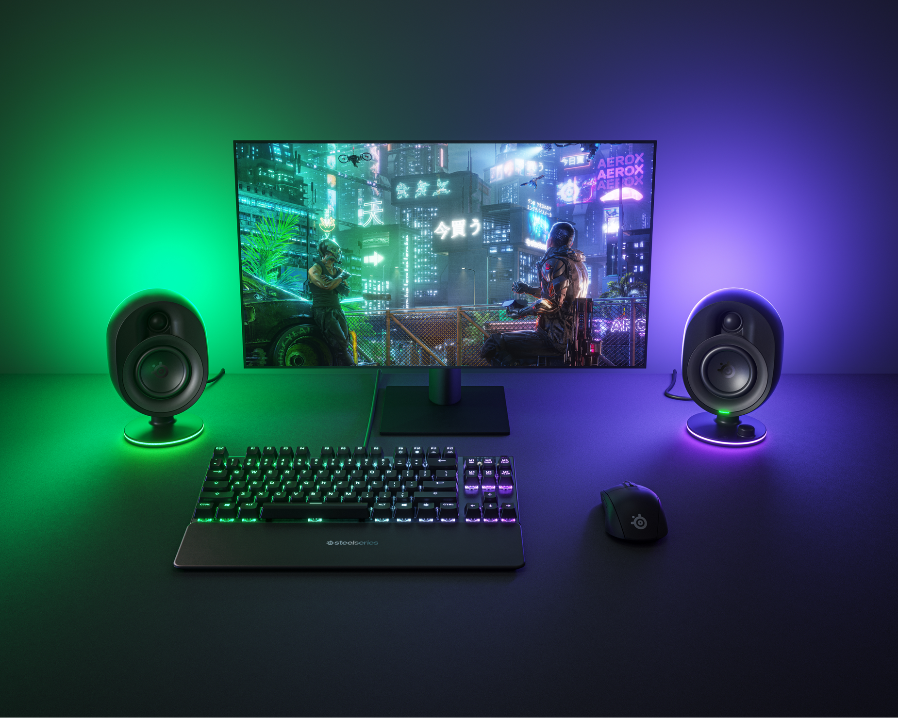 
 A desktop setup featuring the Arena 7 speakers lit up in ambient RGB lighting.
 
