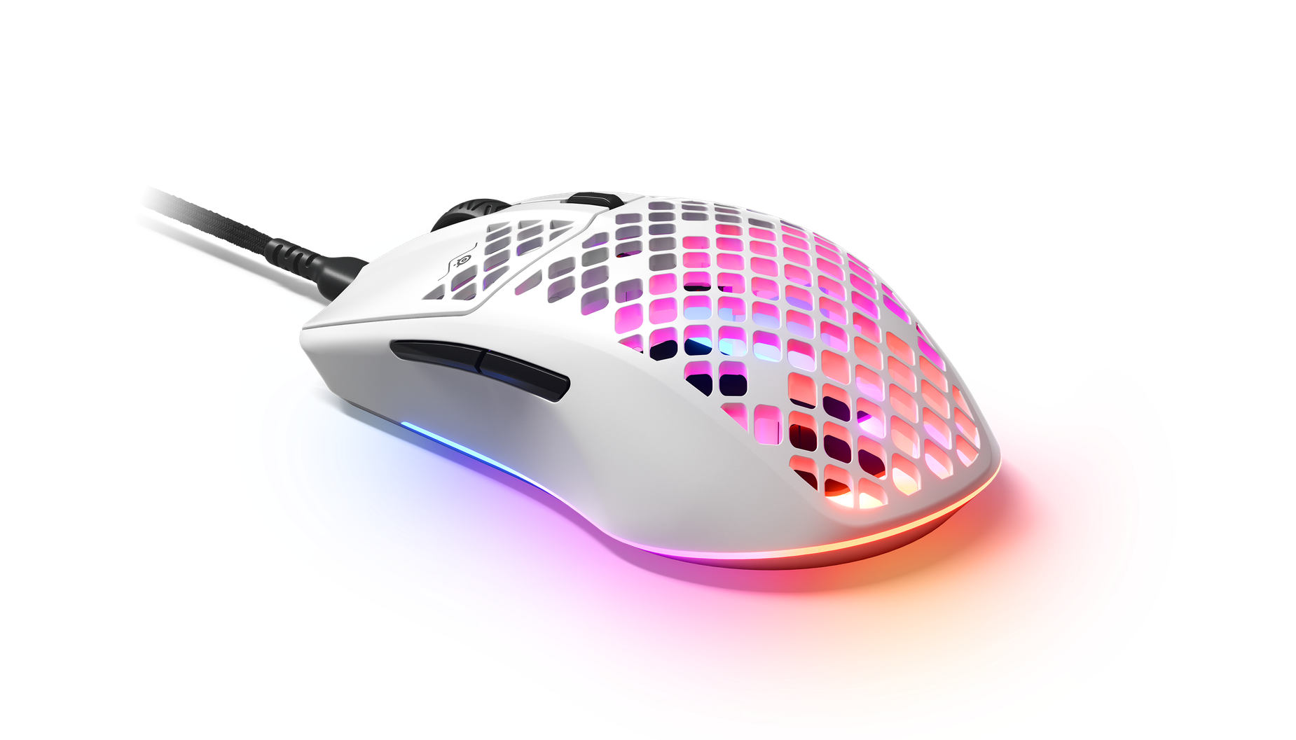 
 Angled view of Aerox 3 (2022) white gaming mouse. Shows RGB gleaming through holes in mouse.
 
