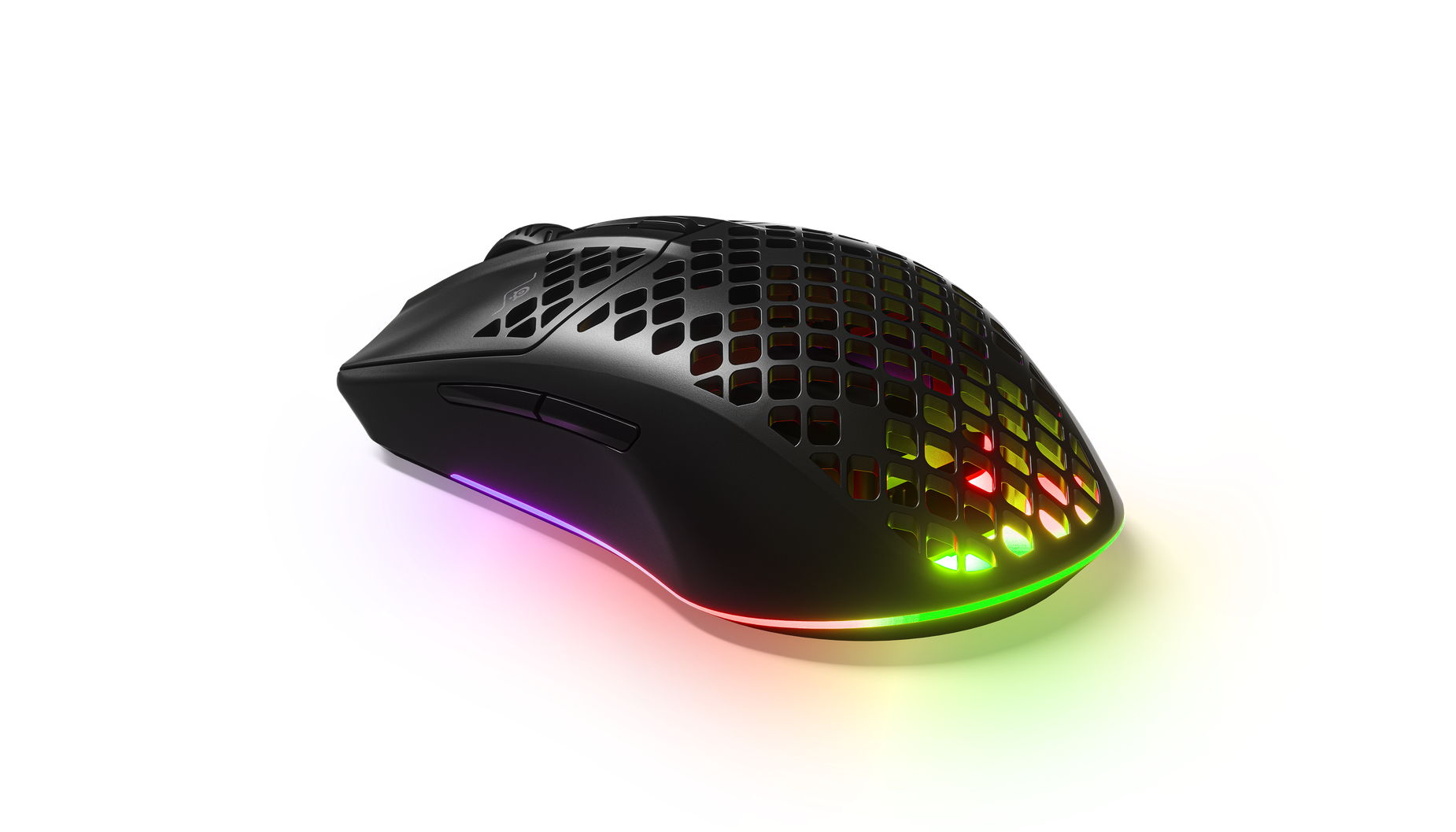 
 Angled view of Aerox 3 Wireless (2022) black gaming mouse. Shows RGB gleaming through holes in mouse.
 