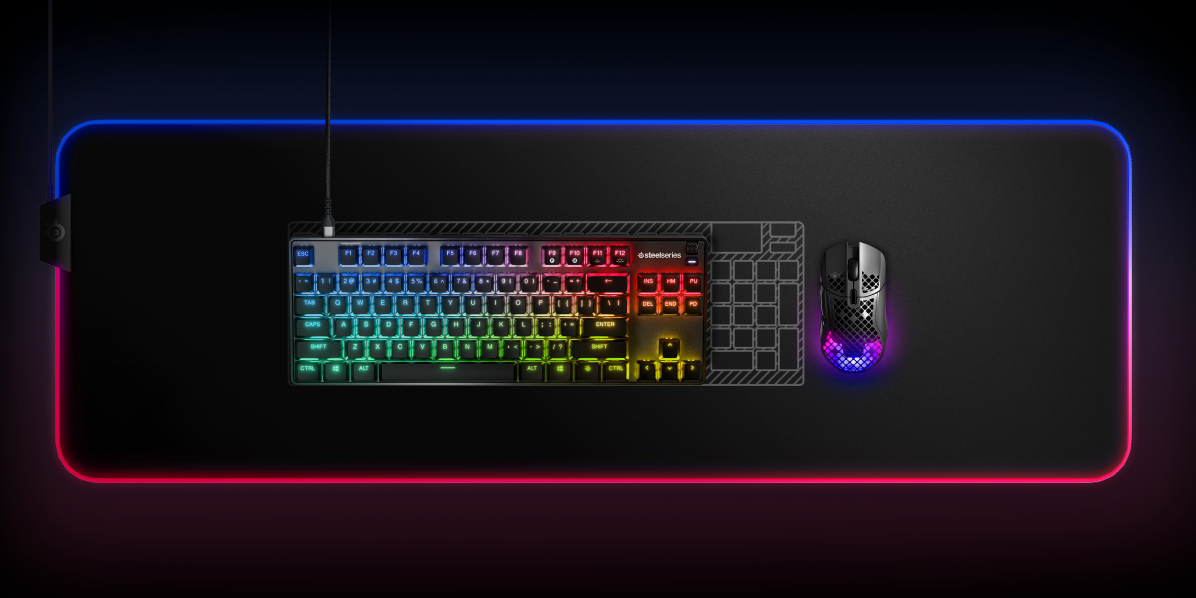 
 An Apex 9 keyboard with a blueprint of a full-size Apex Pro keyboard behind it to illustrate the layout and size difference.
 